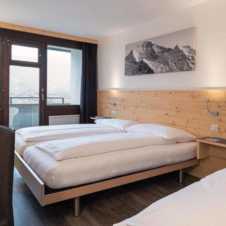 Jungfrau Lodge, Annex Crystal - Habitación Triple con balcón y vistas al Eiger - 10