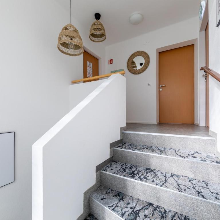 Appartements DAS RETTENBACHER - Four-Bedroom Apartment with Balcony and Mountain View - 9