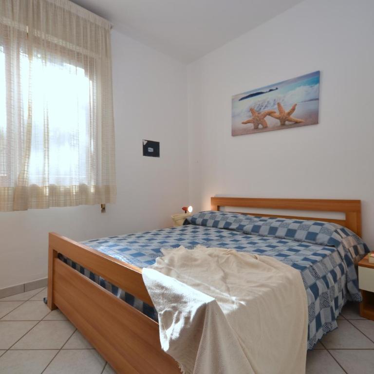 Villaggio Le Palme - Appartamento con 2 Camere da Letto e Giardino - 12