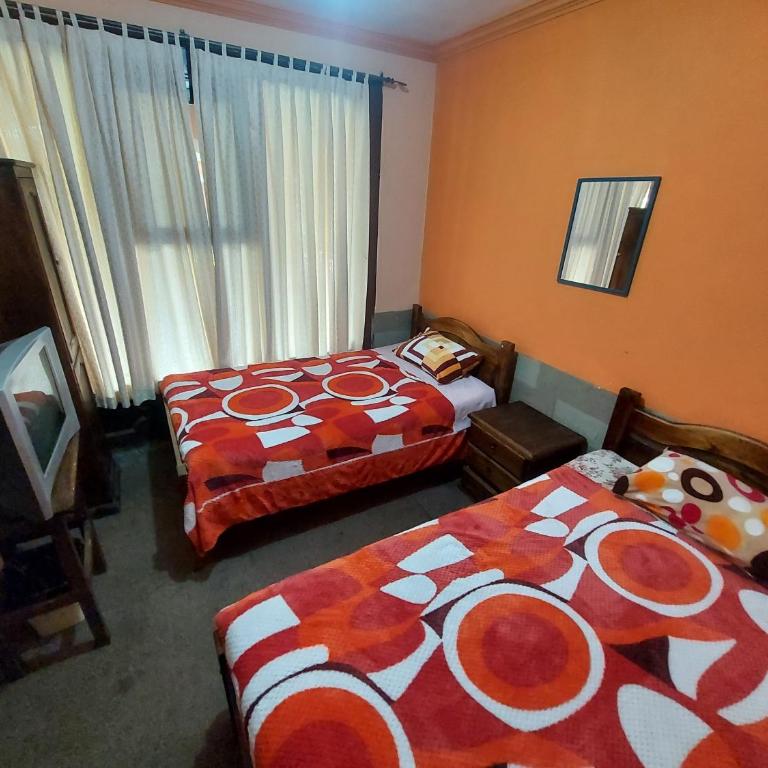 Ñaupa House Hostel - Habitación Doble con vistas al jardín - 2 camas - 4