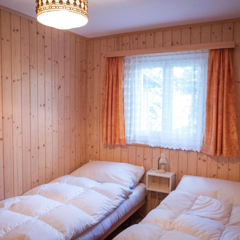 Chalet Sunnuterrasse - Apartment mit Dusche - 6