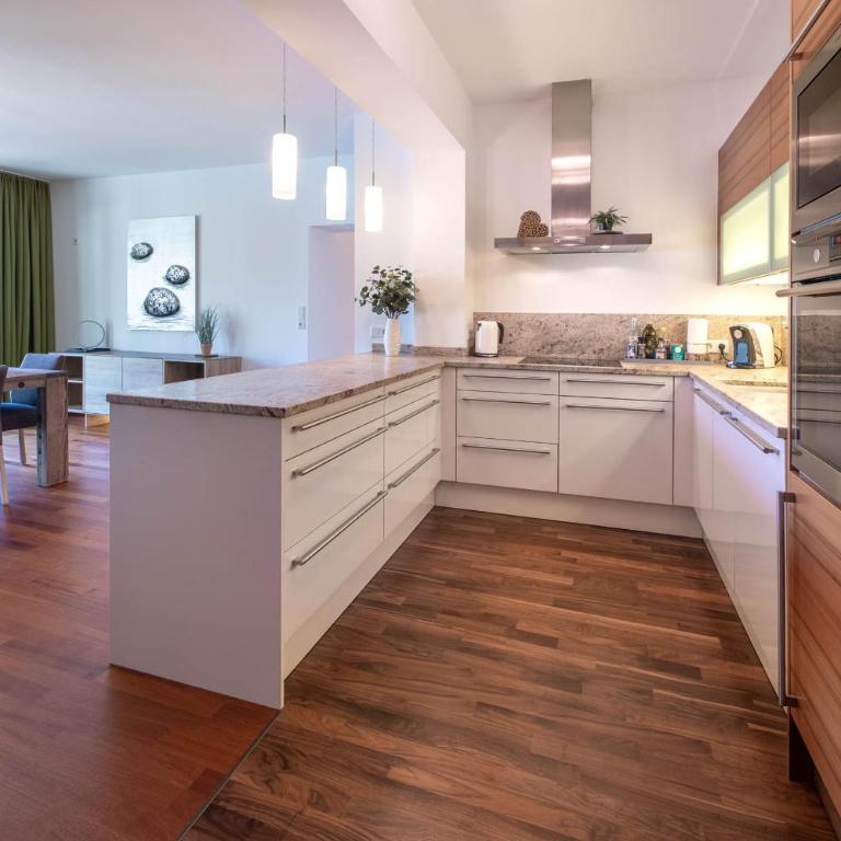 Aparthotel Eichenhof - Appartement Panorama - Apartment mit Seeblick - 5