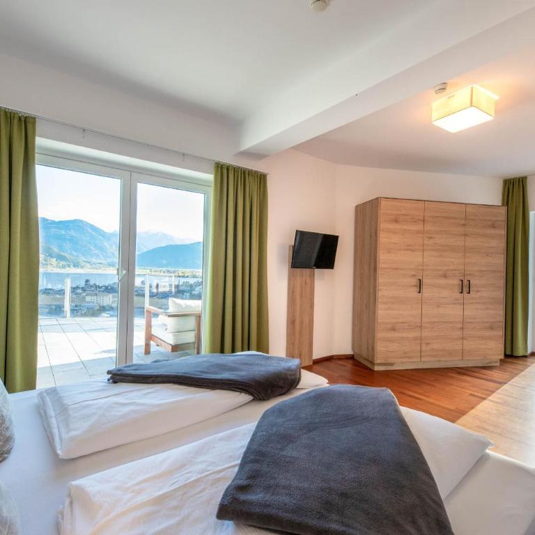 Aparthotel Eichenhof - Appartement Panorama - Apartment mit Seeblick - 23