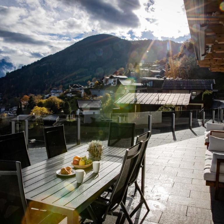 Aparthotel Eichenhof - Appartement Panorama - Apartment mit Seeblick - 55