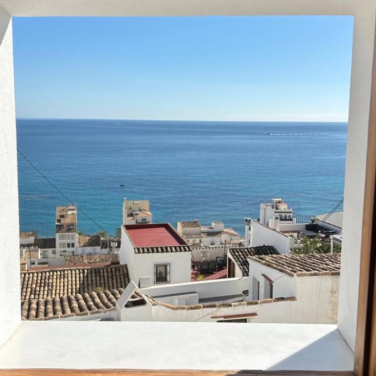 Precioso Apartamento Boutique El Amante - Habitación con cama grande y vistas al mar - 11