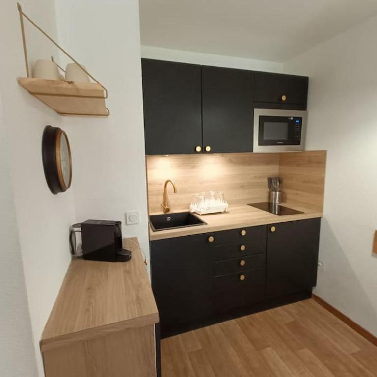Snowliday - Appartement pour 4 personnes, au pied des pistes, en résidence 4 étoiles - Appartement 1 Chambre - 1