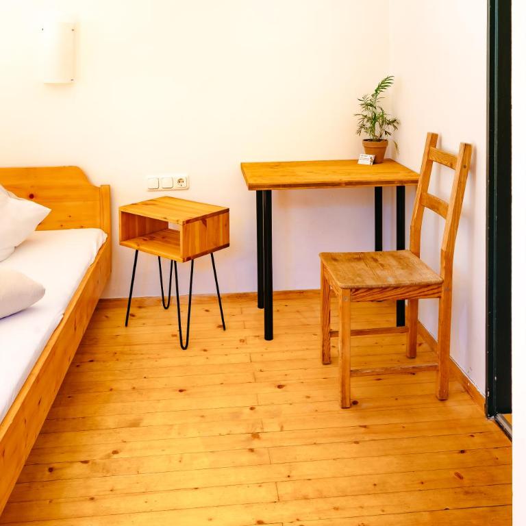 das Cityhouse - Dreibettzimmer mit Balkon - 5