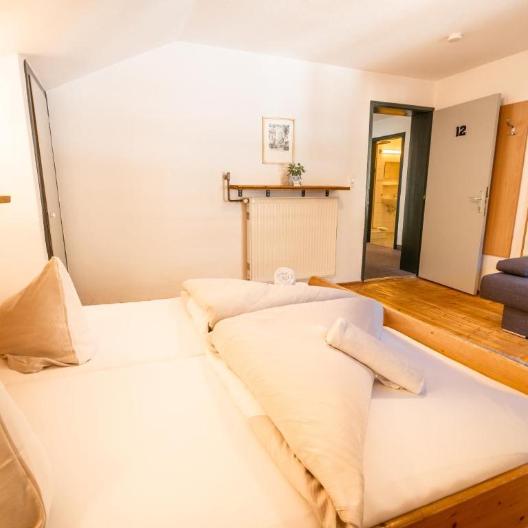 das Cityhouse - Dreibettzimmer mit Gemeinschaftsbad - 5