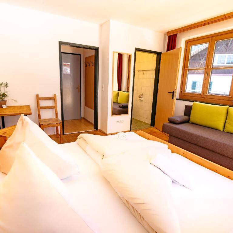 das Cityhouse - Dreibettzimmer mit Balkon - 14