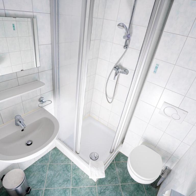 das Cityhouse - Dreibettzimmer mit Balkon - 4