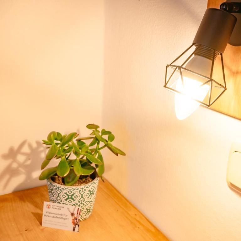 das Cityhouse - Dreibettzimmer mit Balkon - 8