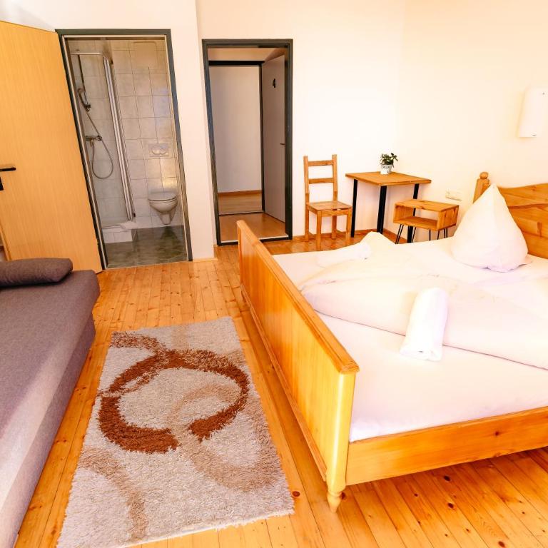 das Cityhouse - Dreibettzimmer mit Balkon - 19