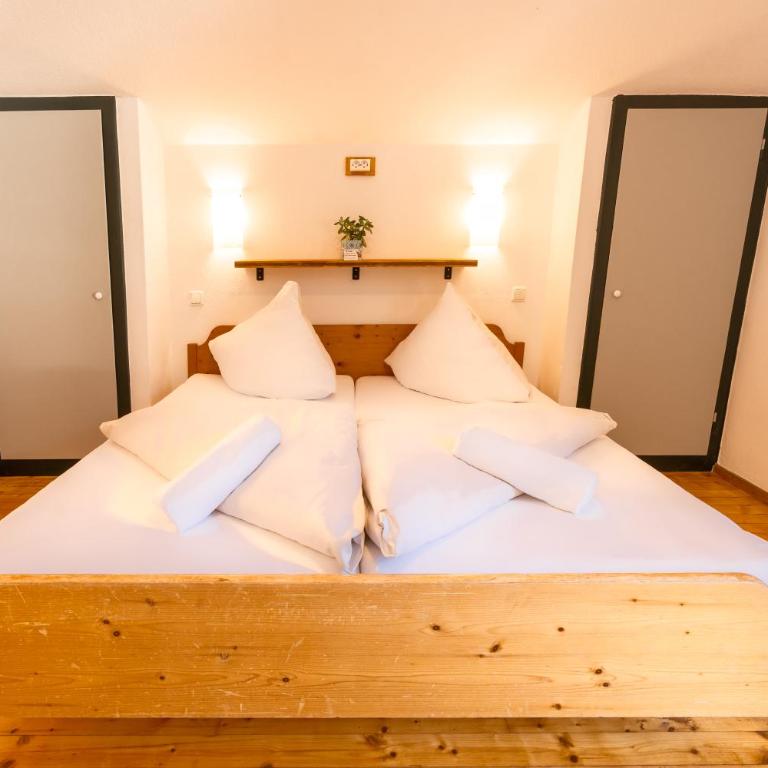 das Cityhouse - Dreibettzimmer mit Balkon - 11