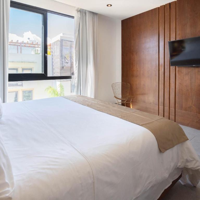 IT Boutique Hotel & Restaurant - Habitación Deluxe con cama extragrande - 9