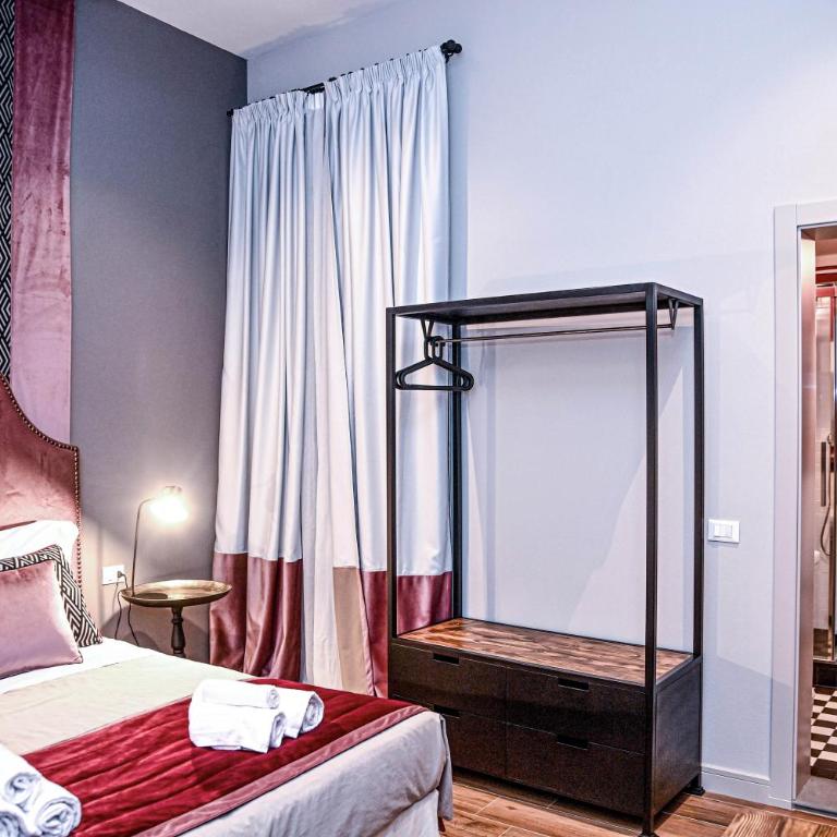 Ricasoli Boutique - Ampia Camera Matrimoniale/Doppia con Letti Singoli - 1