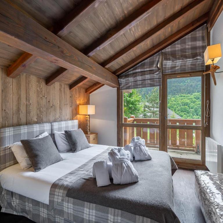 Chalet familial avec jacuzzi à Méribel, 8 adultes + 2 enfants - Chalet 3 Chambres - 2
