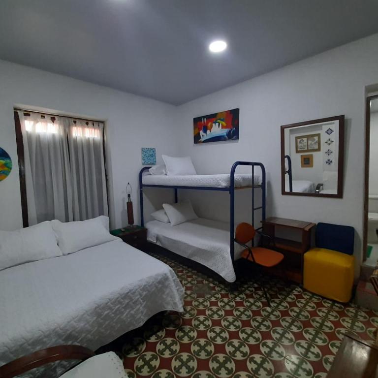 Hotel Posada Turística la Ceiba - Habitación Cuádruple con baño privado - 1