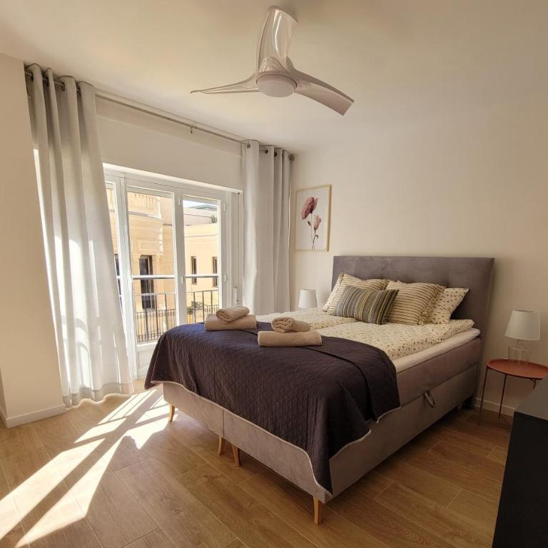 Holidays near the beach - Three-Bedroom Apartment - 6