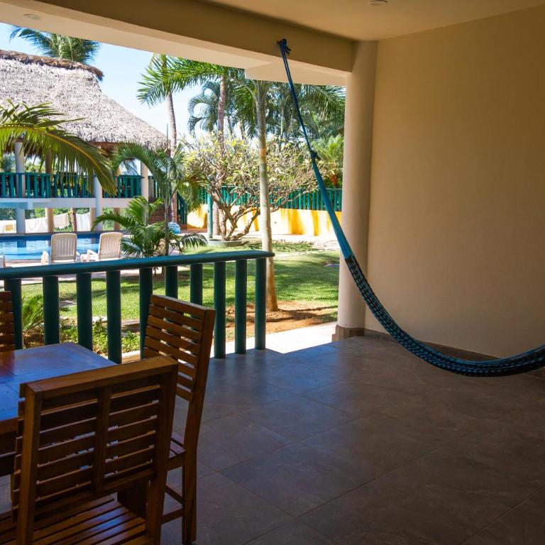 Bungalows Oasis - Habitación Doble con vistas a la piscina - 14