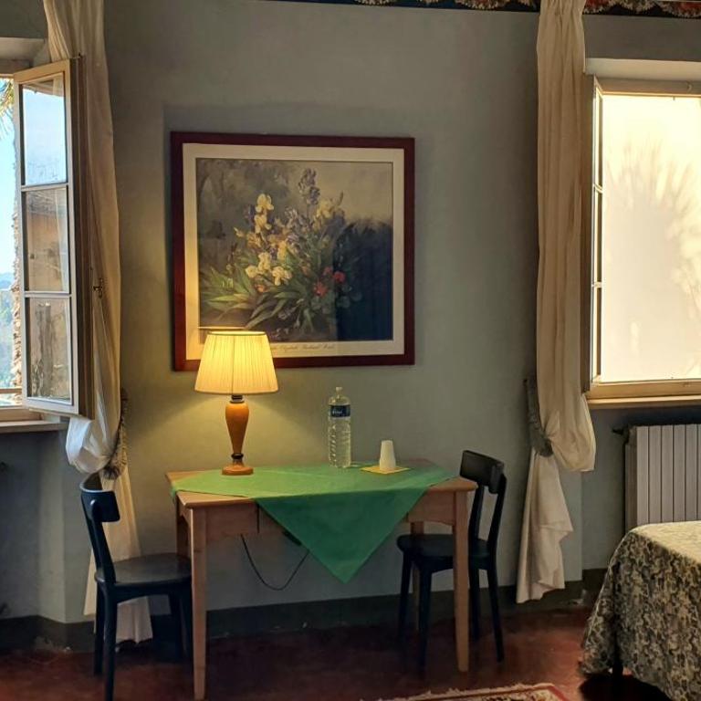 Soggiorno Dimora Del Grifo - Camera Quadrupla con Bagno in Comune - 23