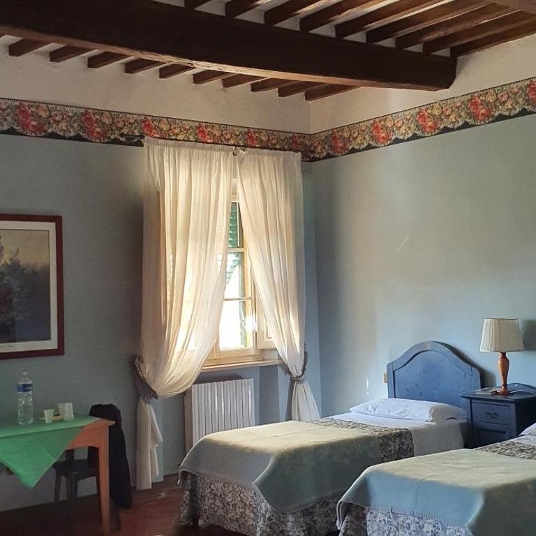 Soggiorno Dimora Del Grifo - Camera Quadrupla con Bagno in Comune - 24