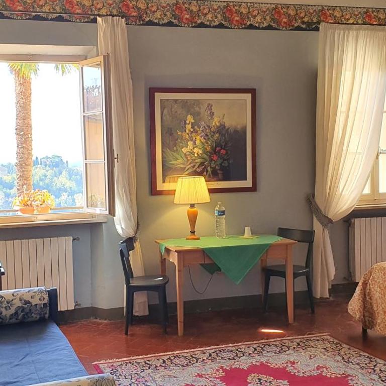 Soggiorno Dimora Del Grifo - Camera Quadrupla Verde con Bagno in Comune - 12