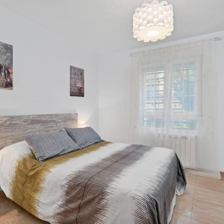 El rincón de Rosa - Three-Bedroom Apartment - 10
