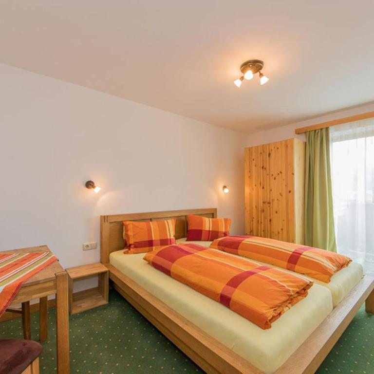 Alpenhof Grafleiten - Familienzimmer mit Seeblick - 4