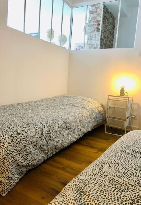 Bienvenue à la Galerie des Sablons - Appartement 2 Chambres - 10