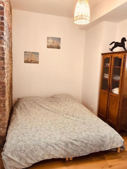 Bienvenue à la Galerie des Sablons - Appartement 2 Chambres - 9