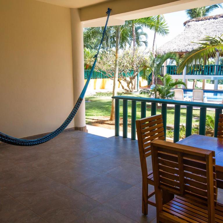 Bungalows Oasis - Habitación Doble con vistas a la piscina - 8