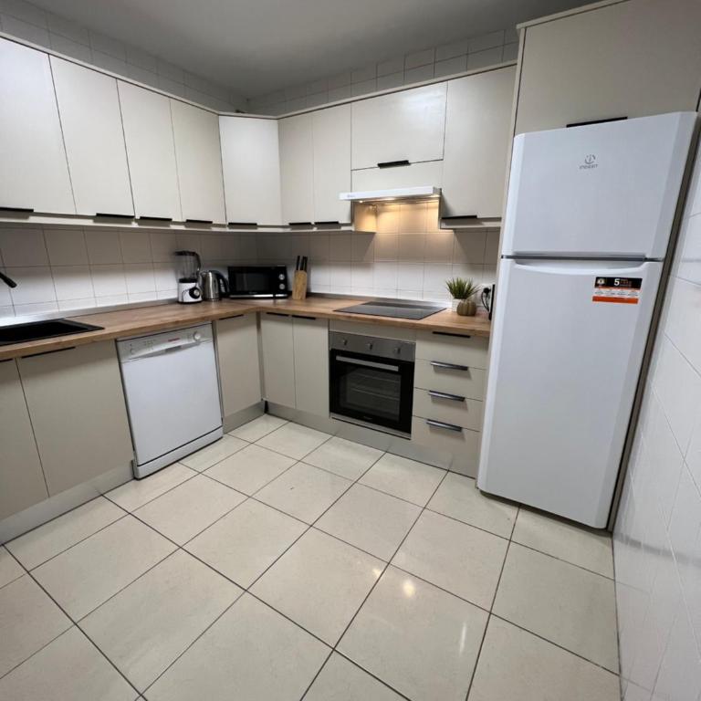 Impeccable large apartment with immense terrace and private garden overlooking the mountain, featuring 2 bedrooms and sleeping up to 4 guests located 100 meters from Plaza Maestranza - Two-Bedroom Apartment - 55
