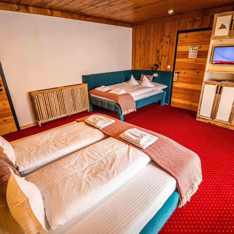 KITZALPEN Pension - Familienzimmer mit eigenem Bad - 5