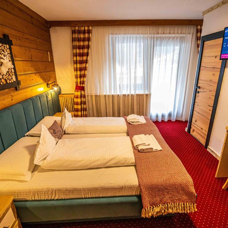 KITZALPEN Pension - Doppelzimmer mit Balkon - 11