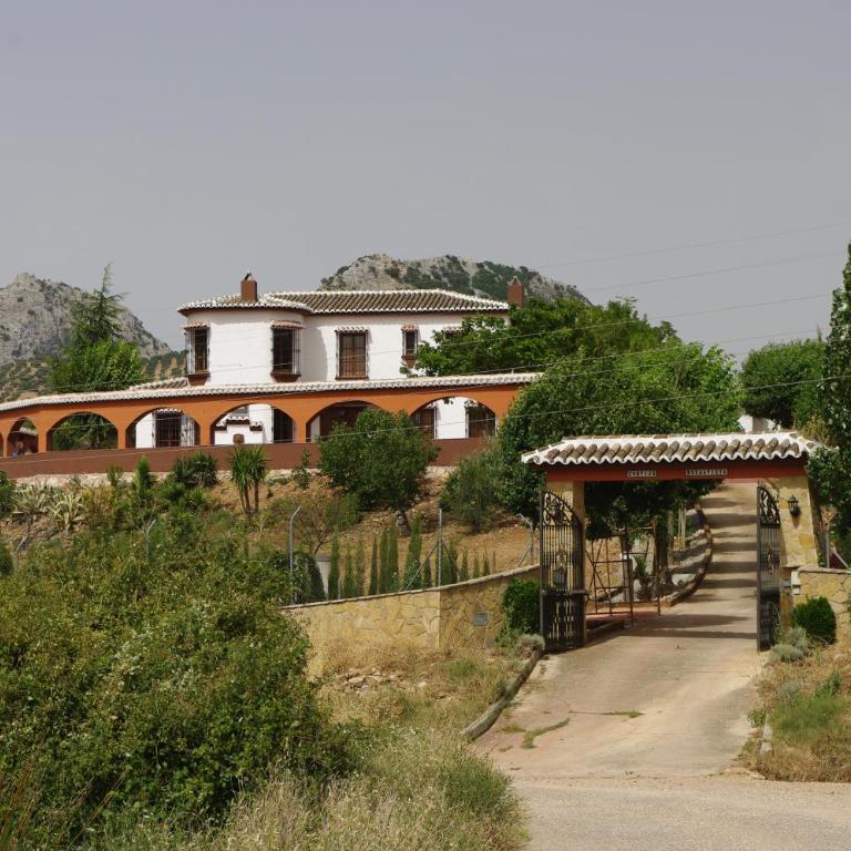 Cortijo Los Arcos - Lujo rural con piscina y vistas espectaculares en Málaga - Five-Bedroom House - 5