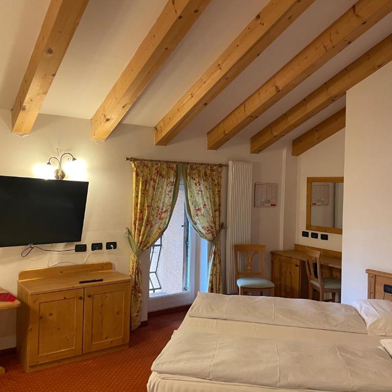 Wellness e Resort Stella Delle Alpi - Camera Tripla - 1