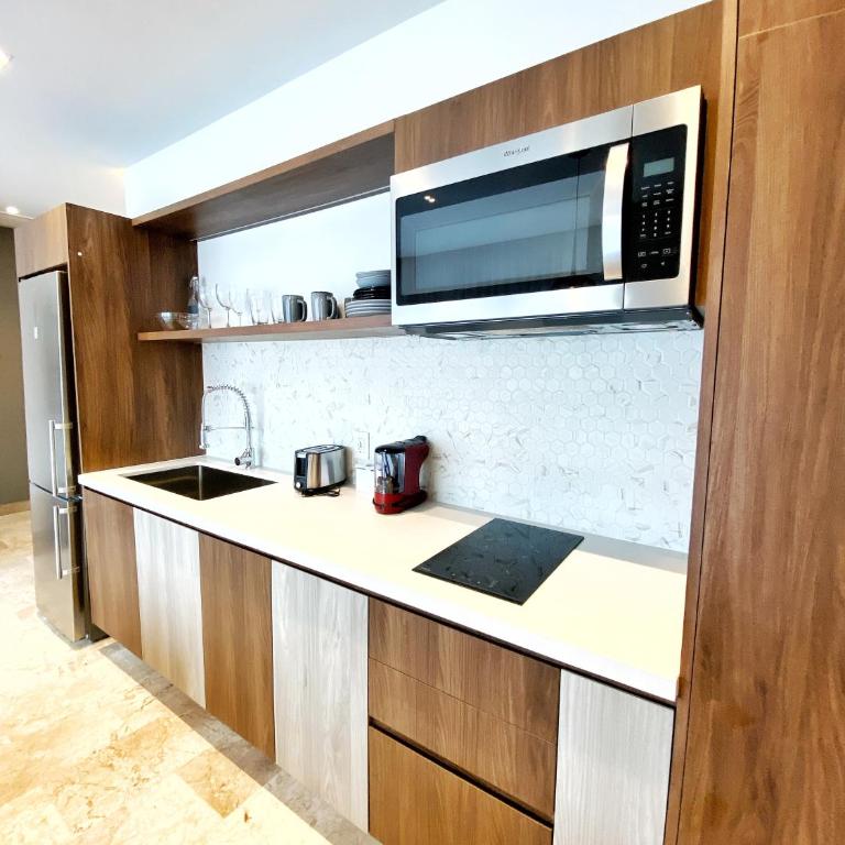 1BR condo de lujo a pasos del mar y de la 5ta avenida - One-Bedroom Apartment - 6