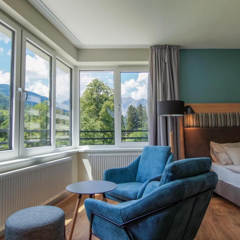 TUI BLUE Montafon - Deluxe Doppelzimmer mit Zustellbett - 1