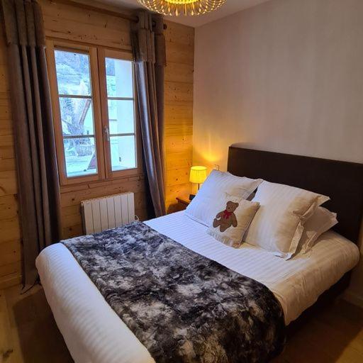 Les Suites du Monetier, alliant le charme et l'authenticité d'un chalet de prestige au cœur du village - Appartement - 45