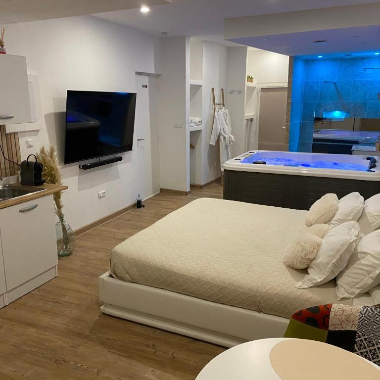 Superbe suite avec jacuzzi patio et sauna - Apartment mit 1 Schlafzimmer - 1