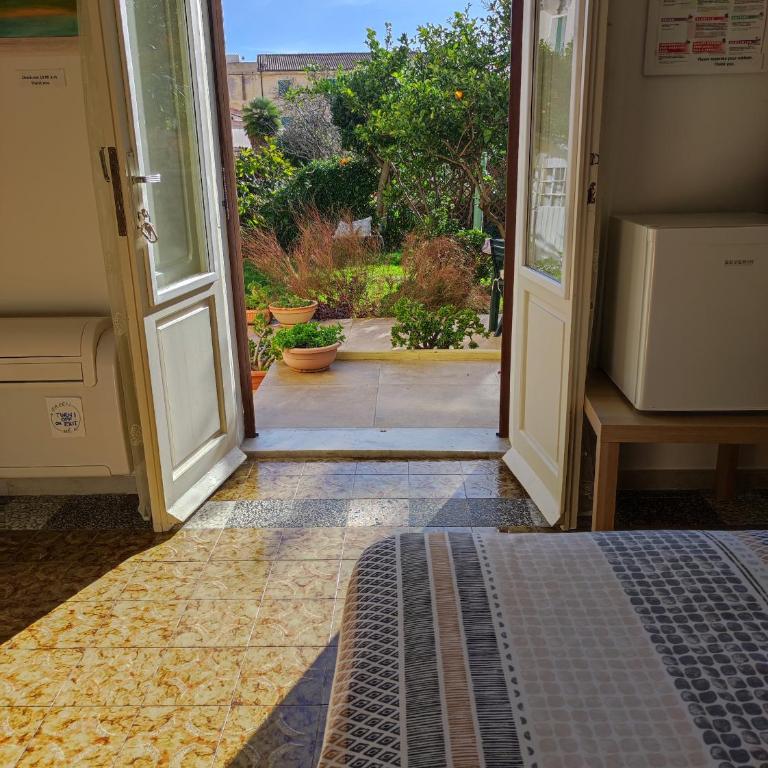 Il Giardino Di Tatiana Rooms - Camera Familiare con Vista Giardino - 15