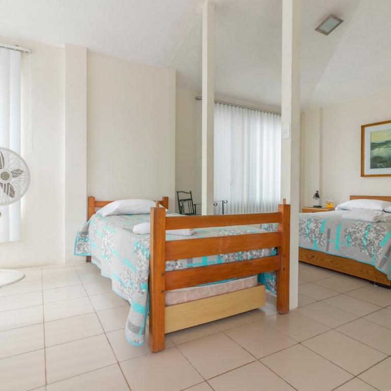 Oceanic Lodge - Habitación Familiar Estándar - 12