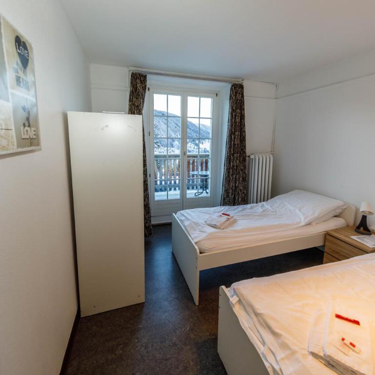 Zentrum Haus Davos - Doppelzimmer mit eigenem Bad - 14
