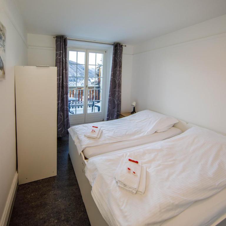 Zentrum Haus Davos - Doppelzimmer mit eigenem Bad - 9