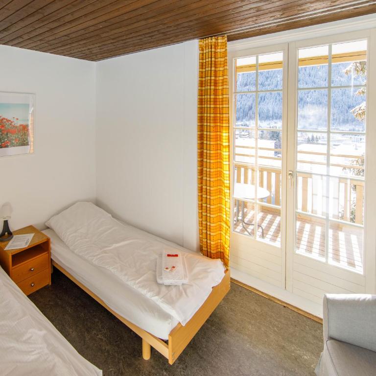 Zentrum Haus Davos - Doppelzimmer mit eigenem Bad - 16