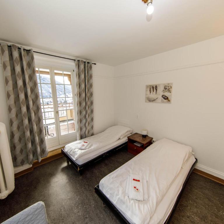 Zentrum Haus Davos - Doppelzimmer mit eigenem Bad - 22
