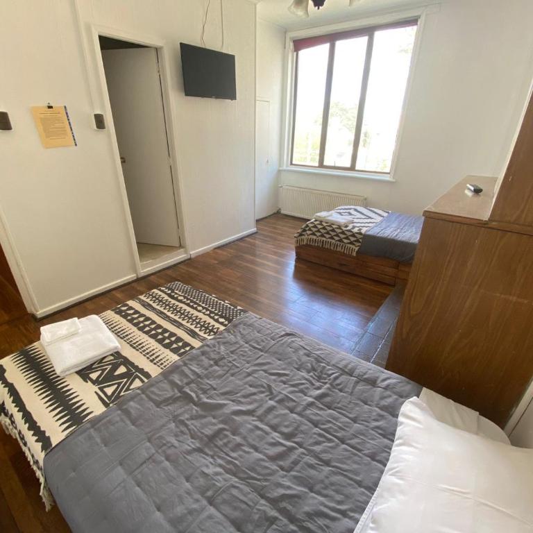 Hostal Ochen - Habitación Doble con baño privado - 2 camas - 6