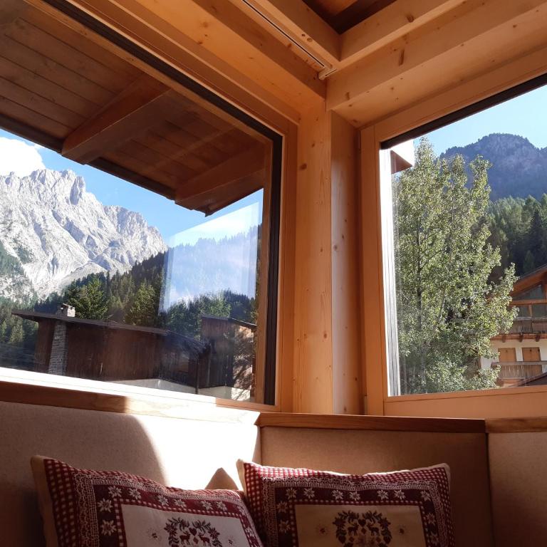 Albergo Arnica - Camera Quadrupla con Vista Montagna - 1