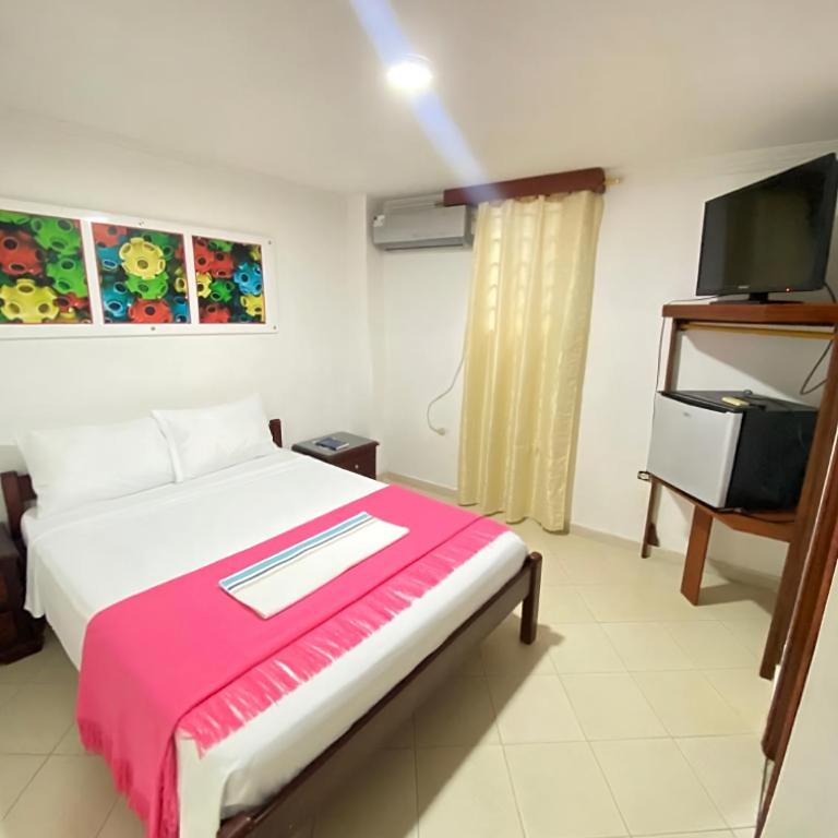 Hotel La Guajira - Habitación con cama grande - 9