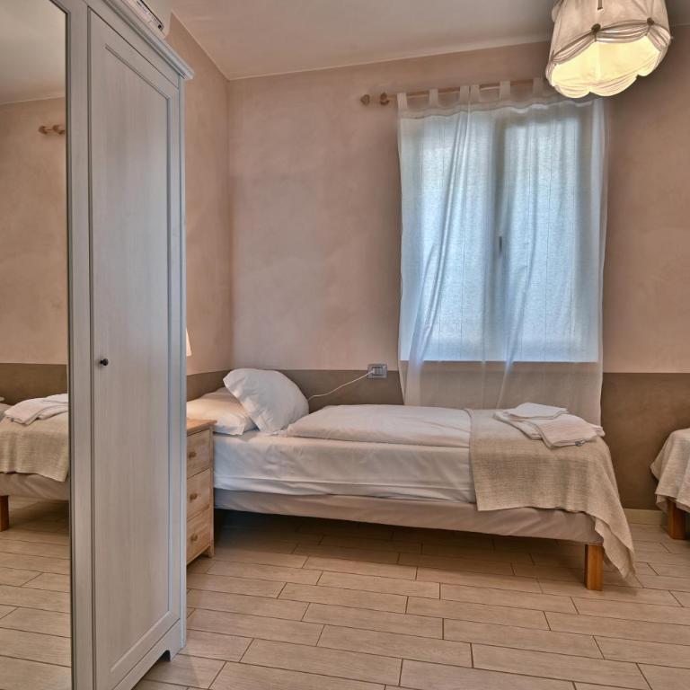BnB Borgo le Vigne - L'Uva rara Only Adults - Appartamento Deluxe con 2 Camere da Letto e Vista Giardino - 9